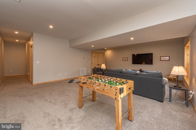 playroom with light colored carpet