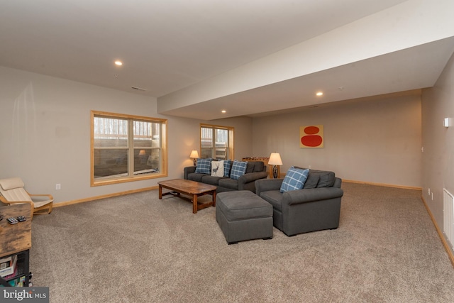 living room featuring light carpet