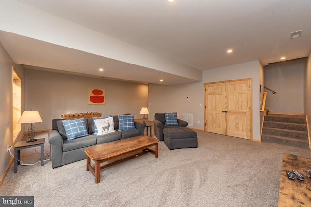 living room featuring carpet