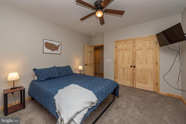 carpeted bedroom featuring ceiling fan