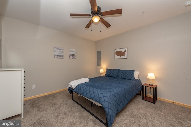 bedroom featuring electric panel, light colored carpet, and ceiling fan