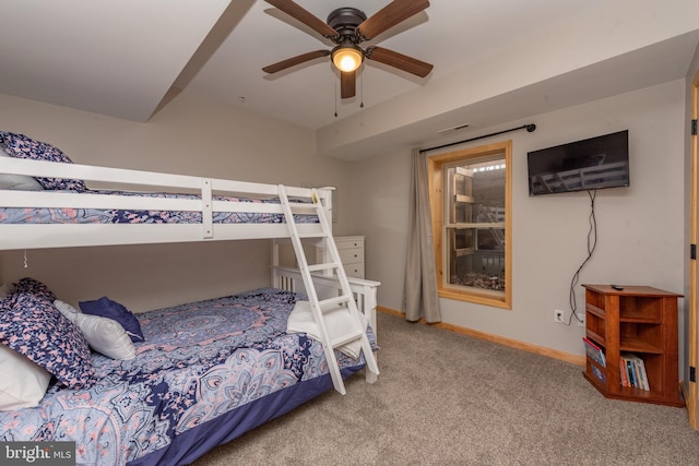 carpeted bedroom featuring ceiling fan