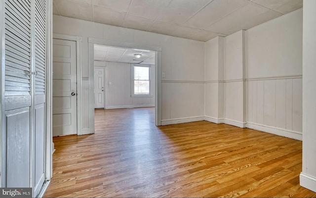 spare room with light hardwood / wood-style floors