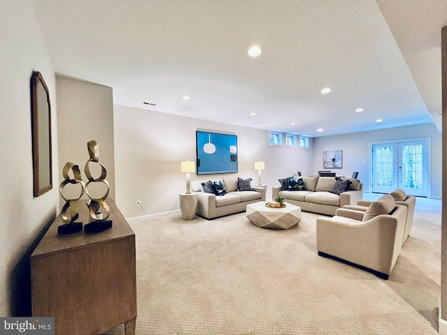 living room featuring light colored carpet