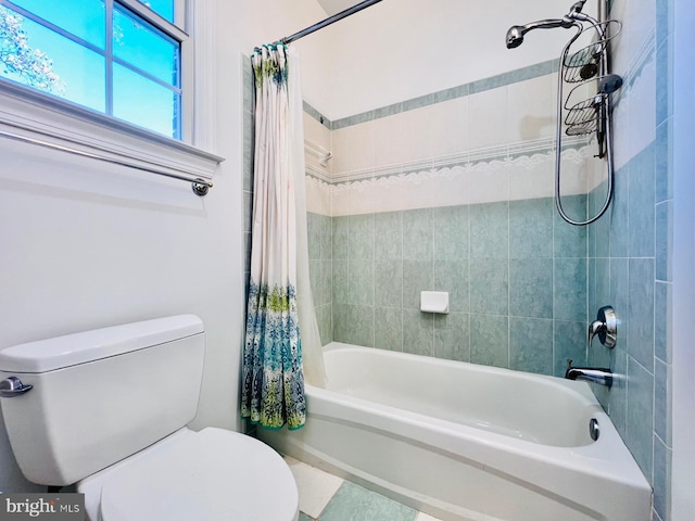 bathroom featuring toilet and shower / bath combo