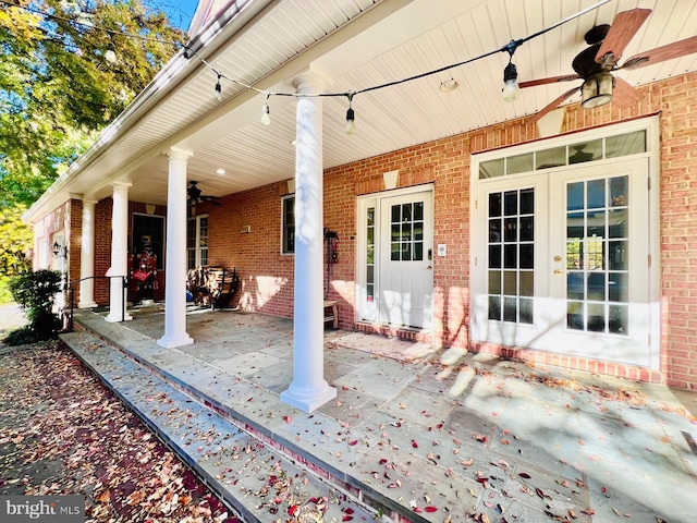 view of patio / terrace featuring ceiling fan and french doors