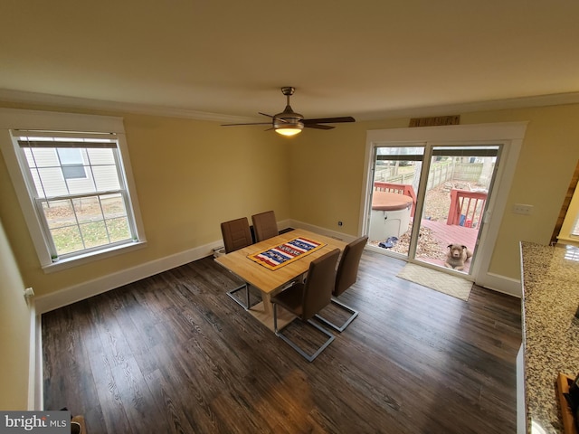 unfurnished dining area with ceiling fan and dark hardwood / wood-style flooring