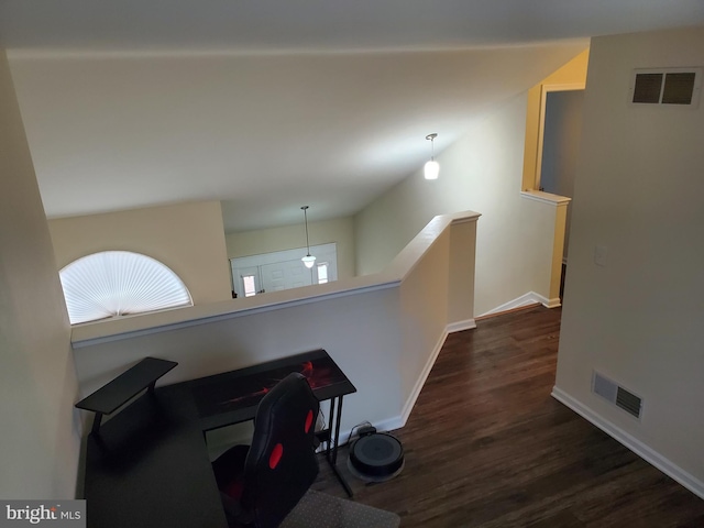 hall featuring dark wood-type flooring