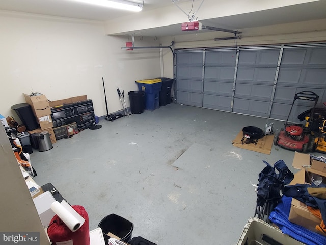 garage featuring a garage door opener