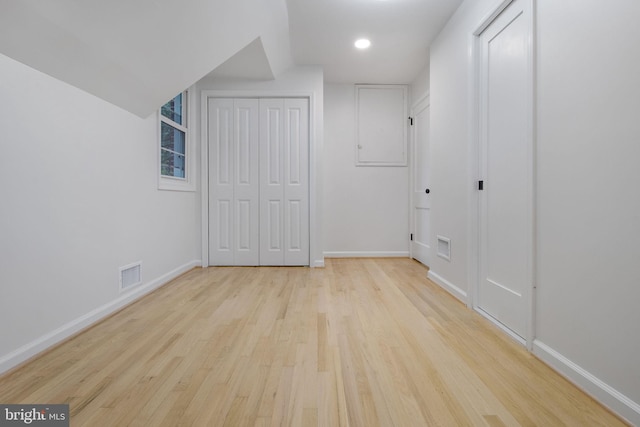 bonus room featuring light hardwood / wood-style flooring