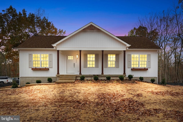 ranch-style house with covered porch