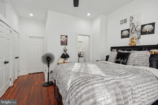 bedroom with ceiling fan and dark hardwood / wood-style flooring