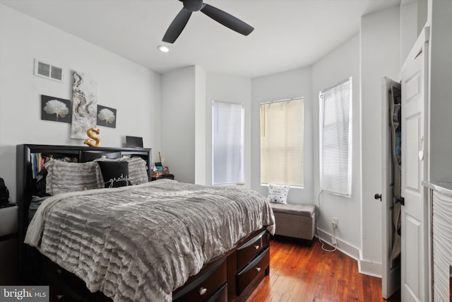 bedroom with wood-type flooring and ceiling fan