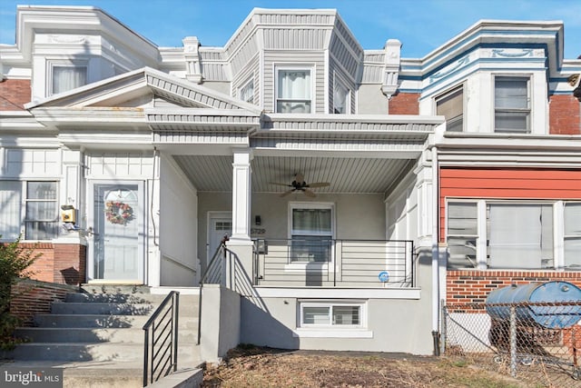 view of front of home with ceiling fan