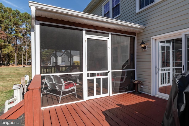 deck featuring a sunroom