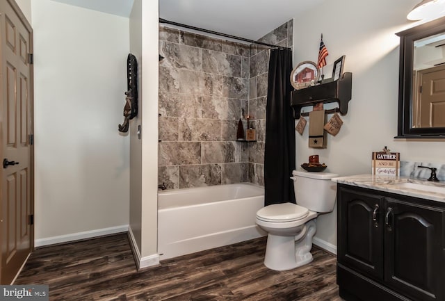 full bathroom with toilet, vanity, hardwood / wood-style floors, and shower / bathtub combination with curtain