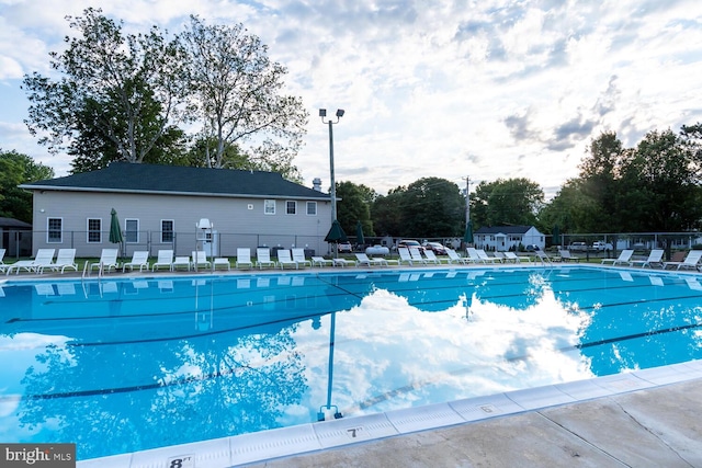 view of swimming pool with a patio area