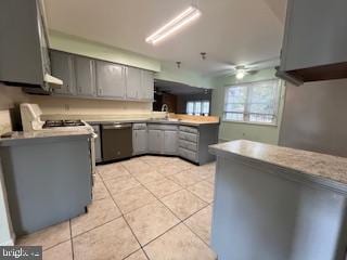 kitchen with dishwasher, gray cabinetry, kitchen peninsula, and light tile patterned floors