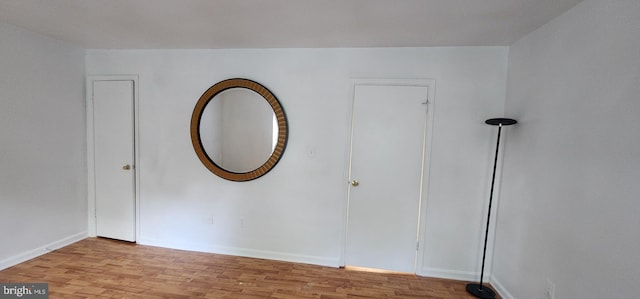 unfurnished room featuring light hardwood / wood-style floors