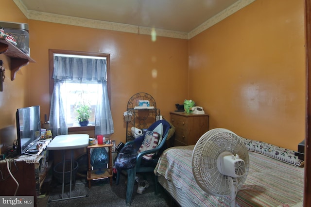 carpeted bedroom featuring ornamental molding