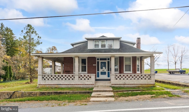 view of front of property with covered porch