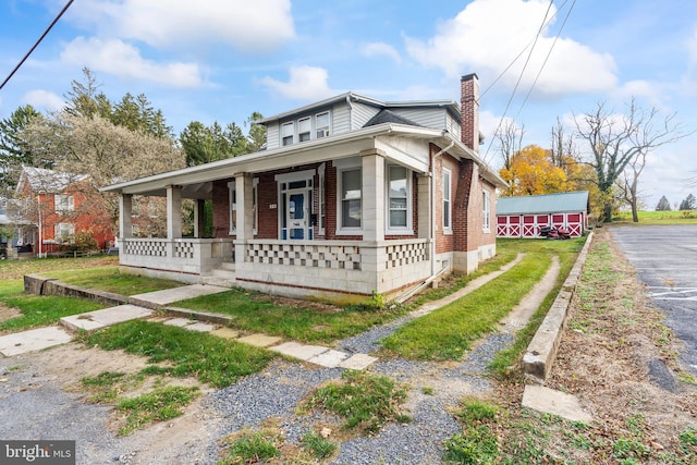 bungalow-style house with covered porch