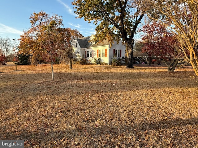 exterior space featuring a front lawn