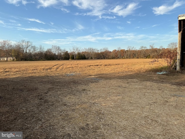 view of yard with a view of rural / pastoral area