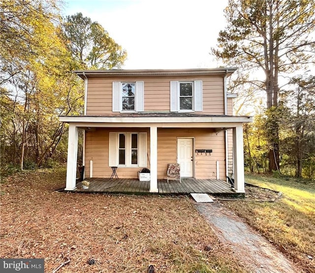 front facade with a porch