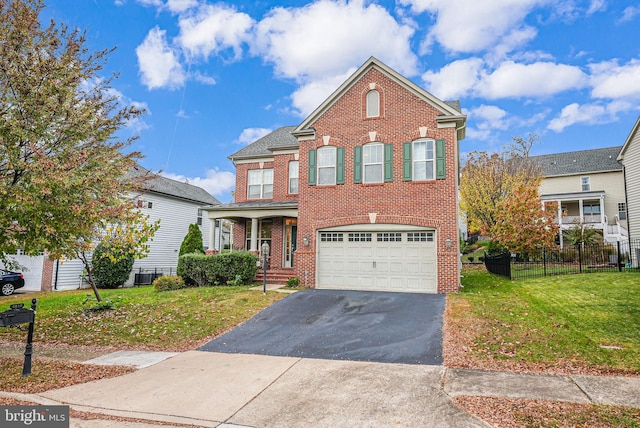 2216 Turnbuckle Ln, Woodbridge, VA 22191 - view of front of house with driveway, brick siding, and a garage