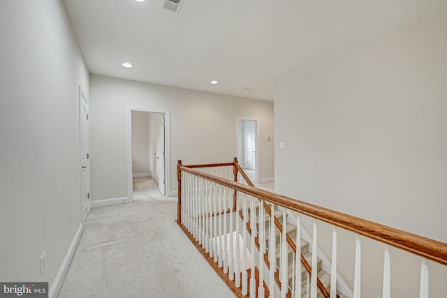 2216 Turnbuckle Ln, Woodbridge, VA 22191 - hallway featuring an upstairs landing, light colored carpet, recessed lighting, and baseboards