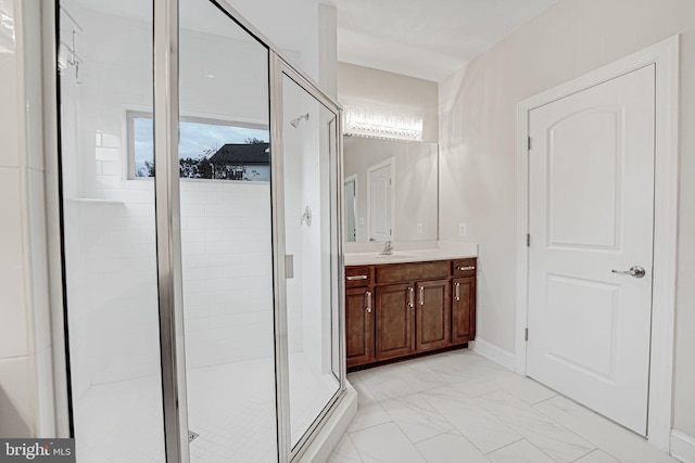 2216 Turnbuckle Ln, Woodbridge, VA 22191 - bathroom featuring a shower stall, vanity, and marble finish flooring