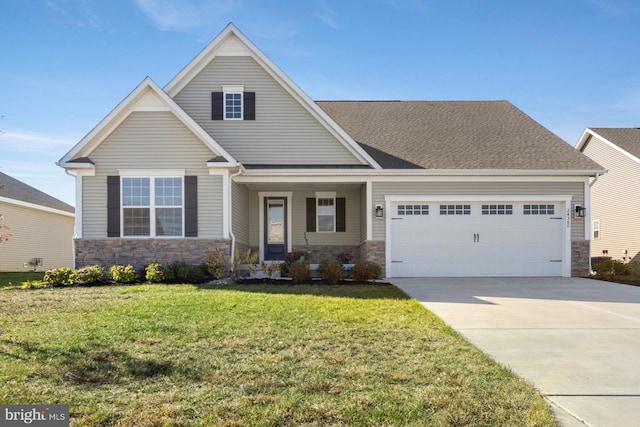 craftsman-style house with a front lawn and a garage