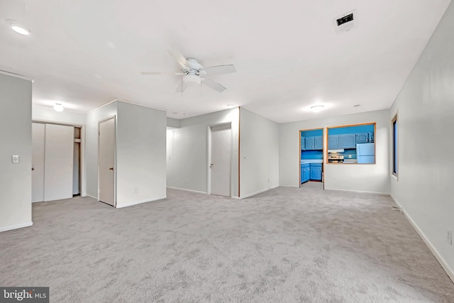 2 Avon, East Windsor, NJ 08520 - unfurnished living room featuring a ceiling fan, carpet, and baseboards