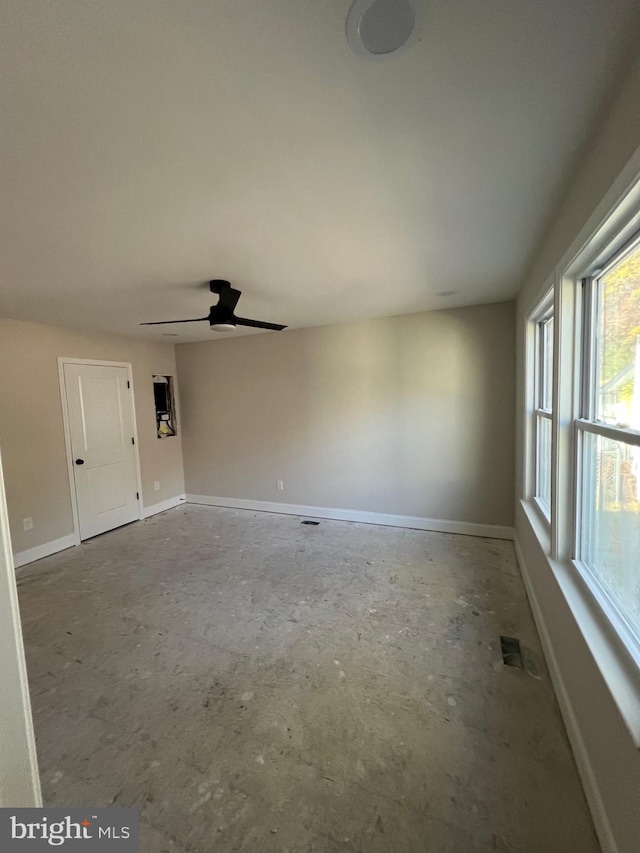 spare room featuring ceiling fan