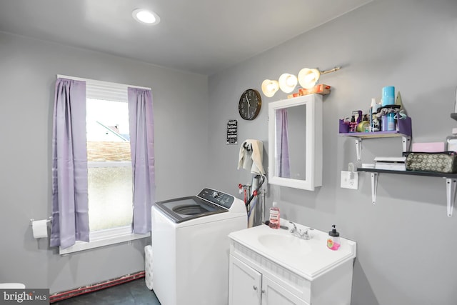 laundry room featuring washer / dryer and sink