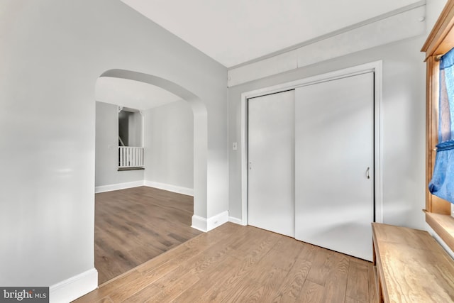 foyer with hardwood / wood-style floors