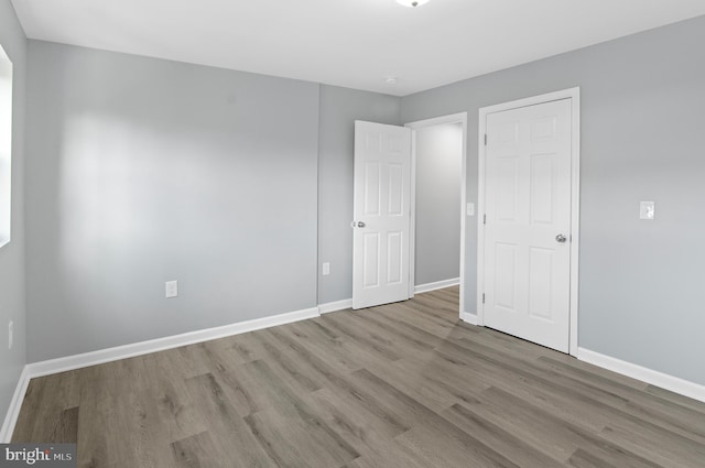 unfurnished bedroom featuring light hardwood / wood-style floors