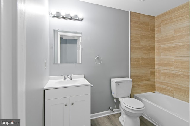 full bathroom featuring toilet, vanity, shower / bath combination, and hardwood / wood-style flooring