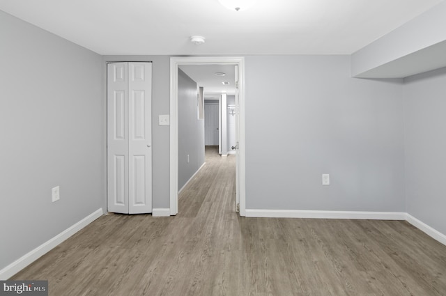 unfurnished room with light hardwood / wood-style flooring