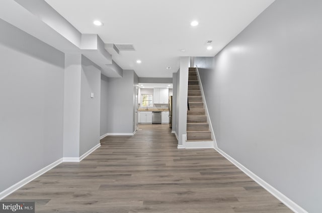 hall featuring hardwood / wood-style floors