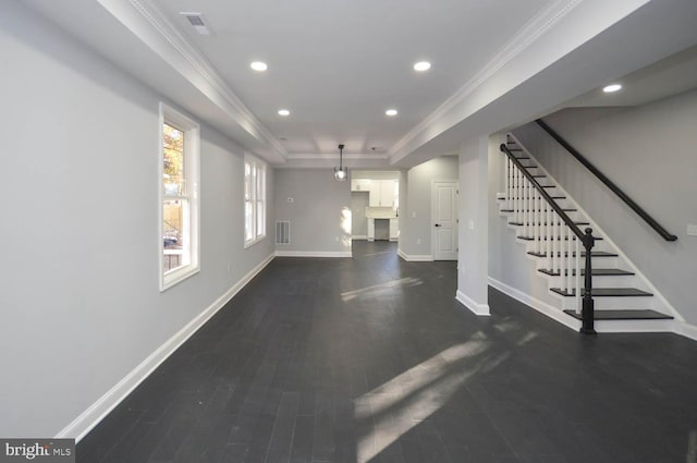 6200 Clay St NE, Washington, DC 20019 - unfurnished living room with crown molding, stairs, baseboards, a raised ceiling, and recessed lighting