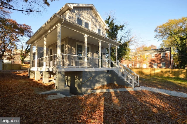 6200 Clay St NE, Washington, DC 20019 - view of property exterior featuring a porch, stairs, and fence