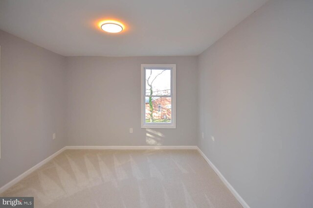 empty room with carpet flooring