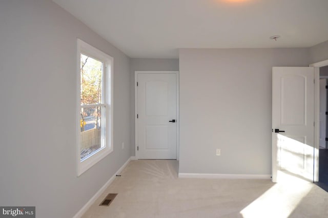 6200 Clay St NE, Washington, DC 20019 - unfurnished bedroom with baseboards and light colored carpet