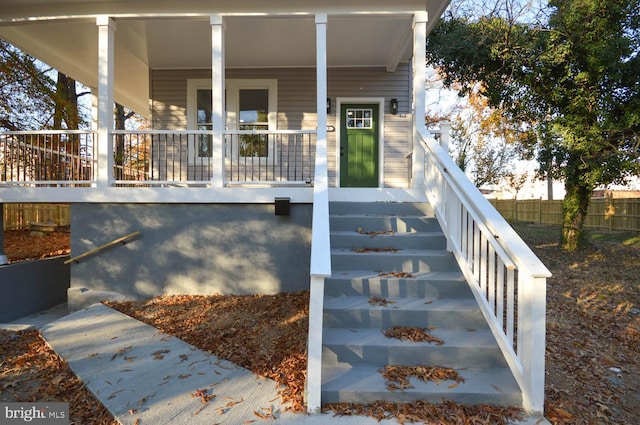 property entrance with a porch