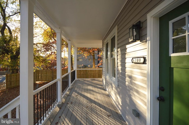 wooden deck featuring a porch