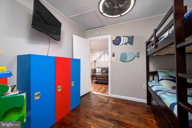 interior space featuring dark hardwood / wood-style floors and crown molding