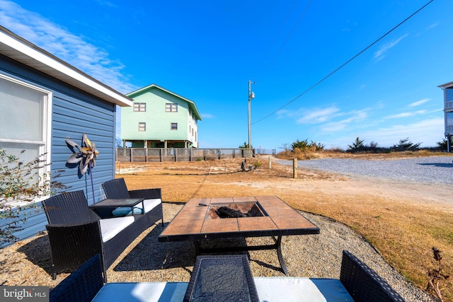 view of yard featuring a fire pit