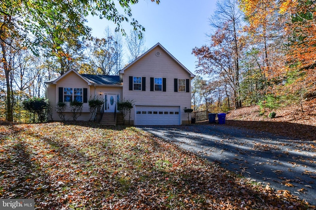 view of front of property with a garage